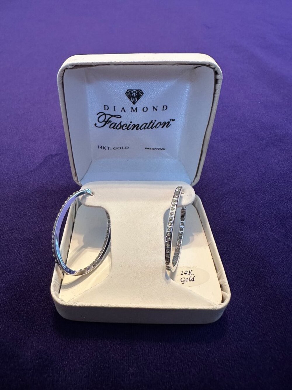 White gold and Diamond Fascination hoop earrings
